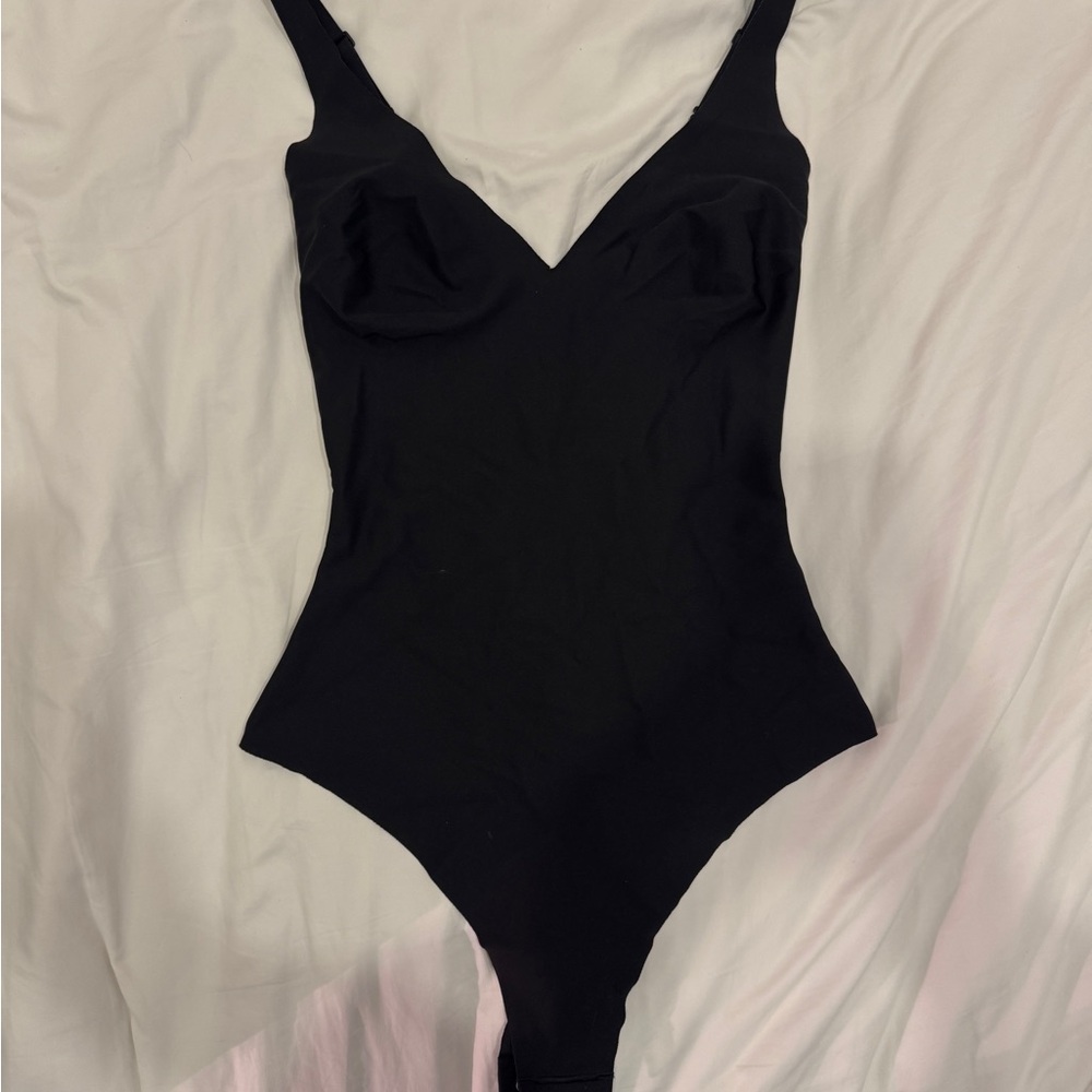 SKIMS Unlined Plunge Thong Bodysuit